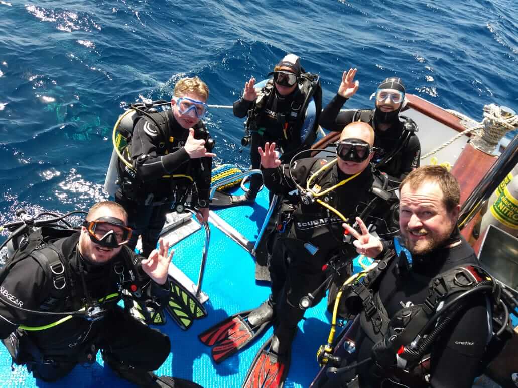 Divers kitting up on a Red Sea boat